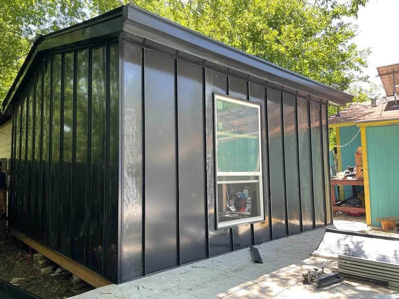 Black standing seam metal wall panels for Metal Roof Installation in Central